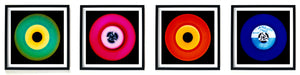 Photographs by Heidler and Heeps. A horizontal line of 4 photographs of vinyls in striking colours, with black frames. 