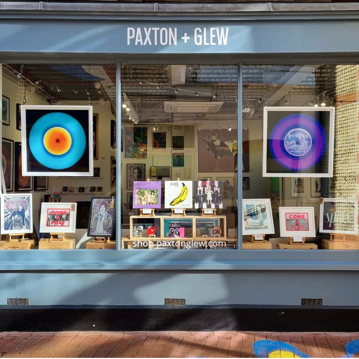 Paxton and Glew Gallery Brighton shop window featuring the Heidler and Heeps vinyl collection artwork limited edition prints. 