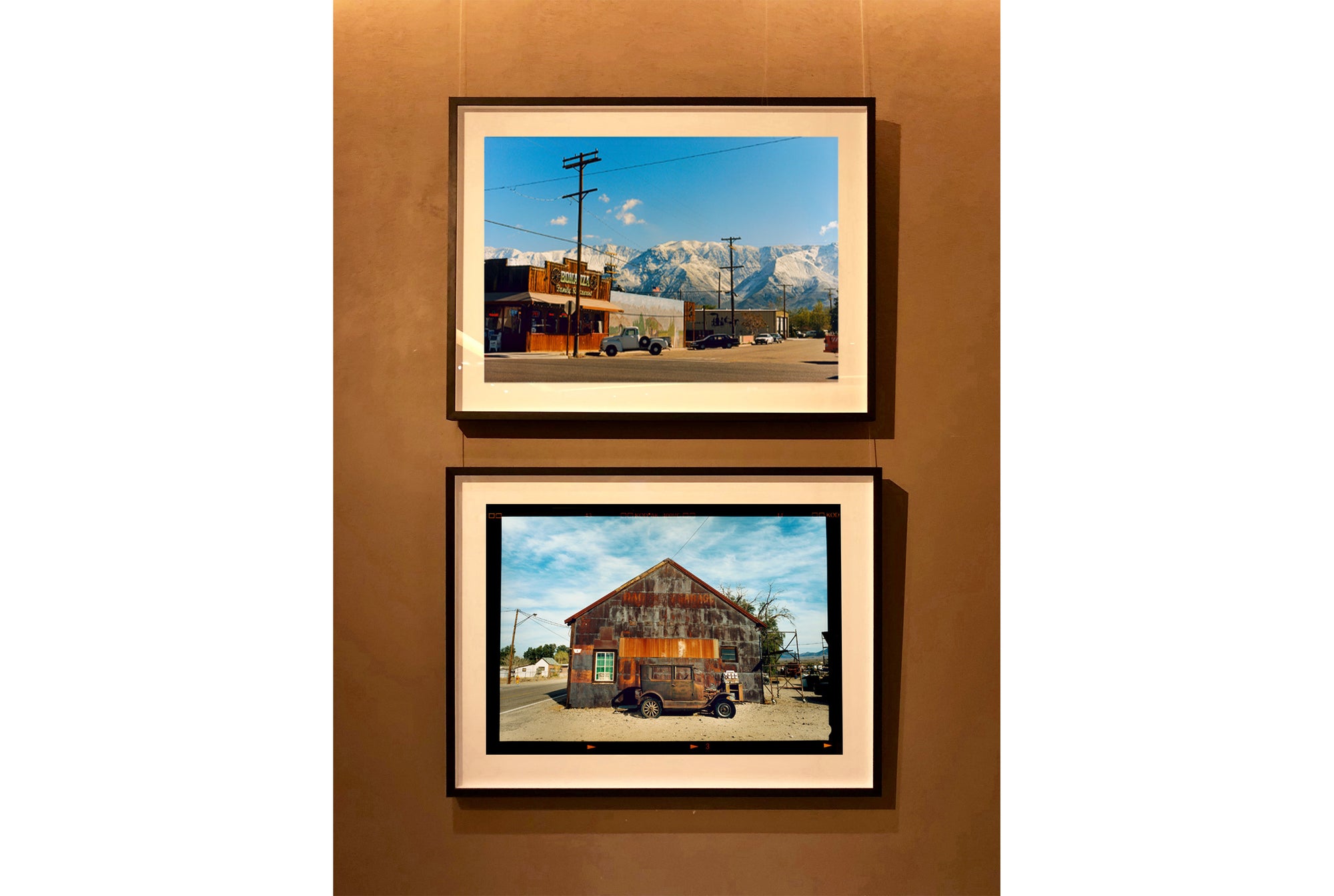 There is a cinematic style to this artwork, 'Lone Pine', taken in a former movie town in California where many Western films were made. Taken outside Richard's iconic interior photograph 'Bonanza Café', set in the Owens Valley against a mountainous  backdrop.