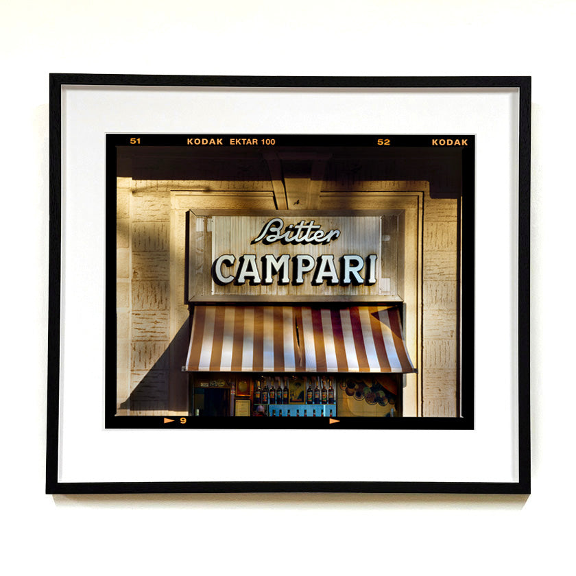 Recently sold artwork Bitter Campari Sign Italian street photography by Richard Heeps framed in black.