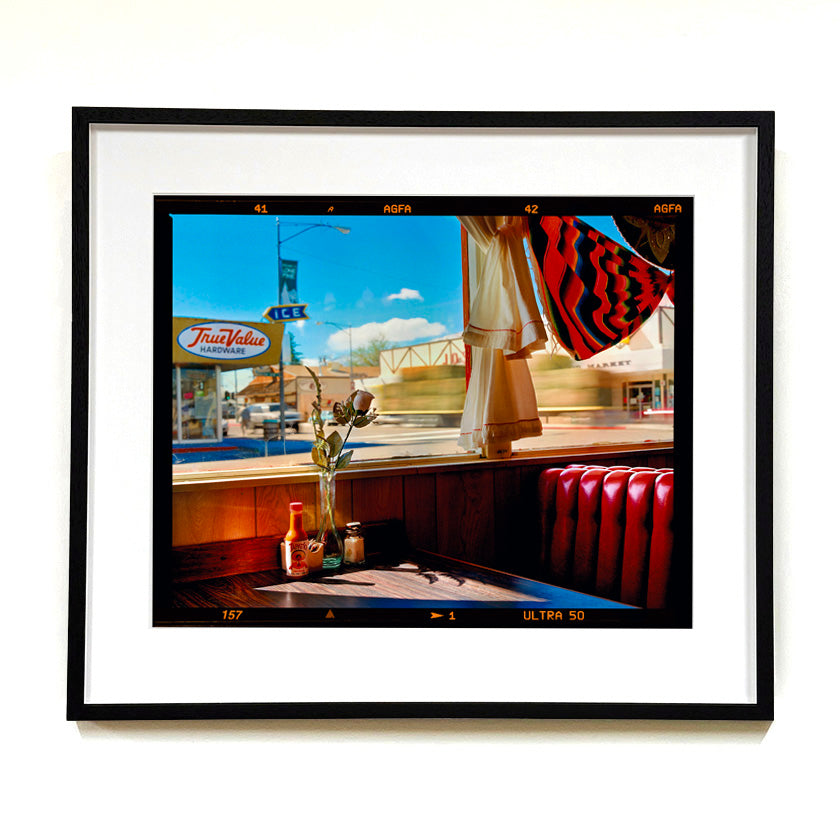 Recently sold artwork Bonanza Cafe American diner interior photograph by Richard Heeps framed in black.
