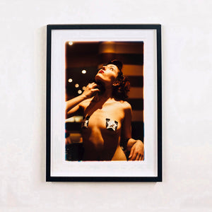 Delilah burlesque backstage photography by RIchard Heeps framed in black.