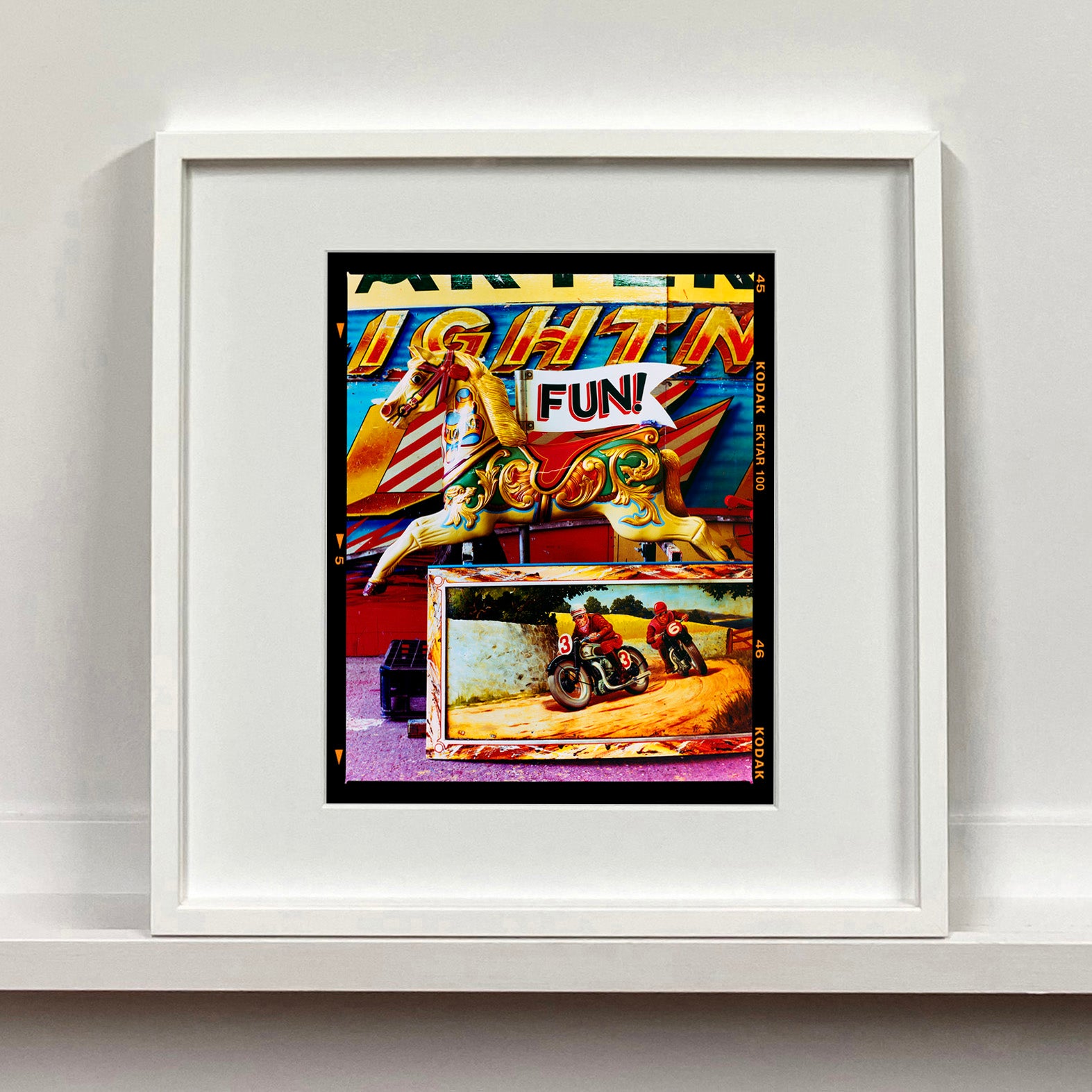 FUN! carousel horse photograph by Richard Heeps in a small white frame.