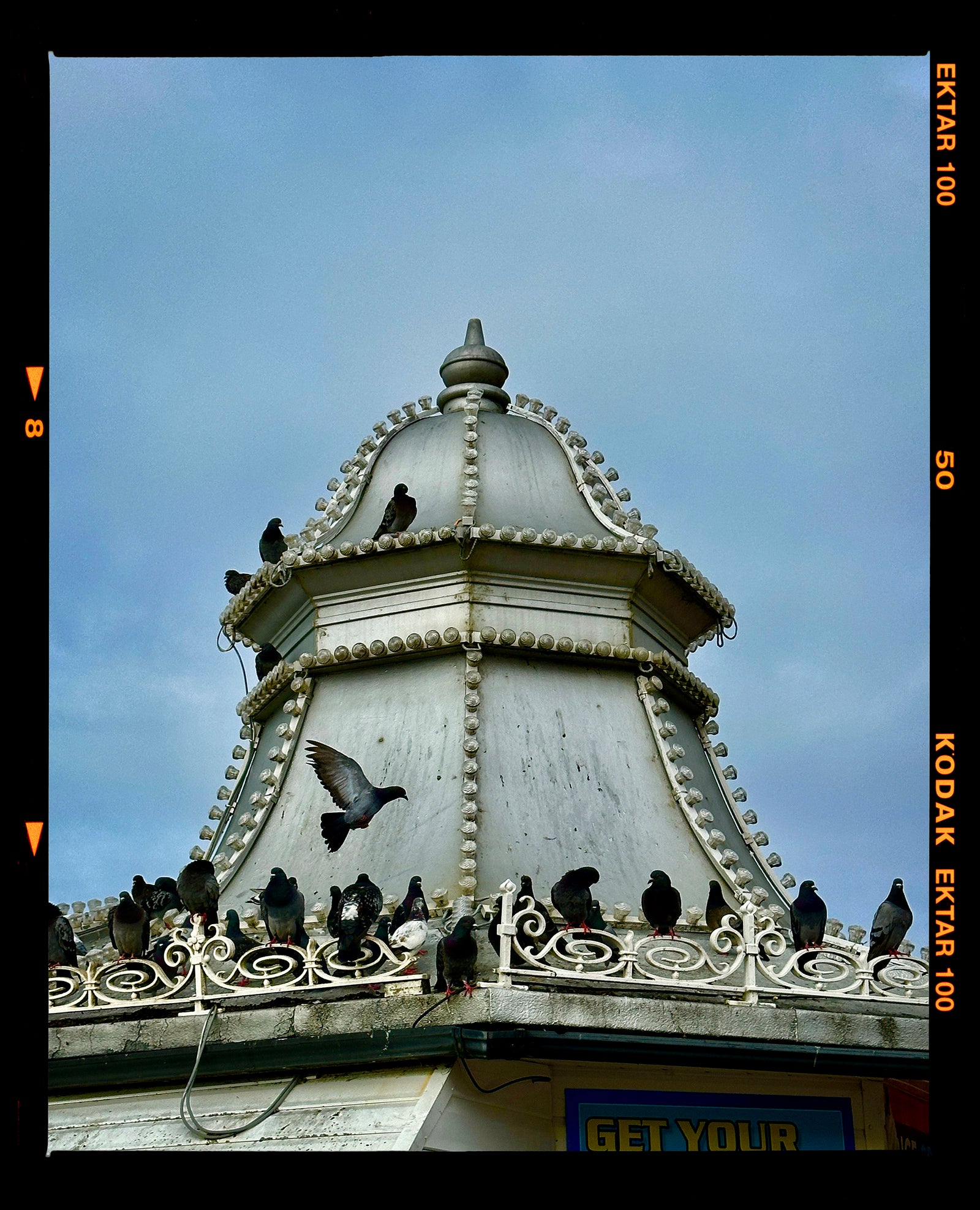 Brighton Palace Pier forecourt Dome, home to pigeons, photograph by Richard Heeps.