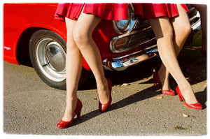 Glamour Cabs red classic car and vintage fashion photograph by Richard Heeps