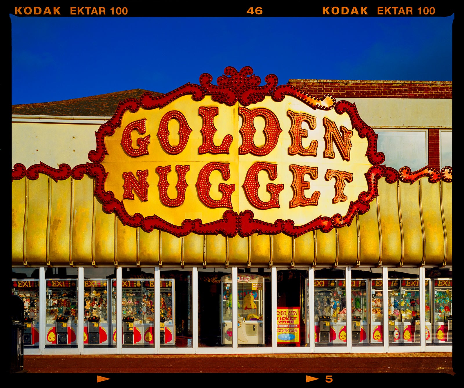 Golden Golden Nugget, seaside arcade facade at dawn, typography photography from Richard Heeps' series, On-Sea.
