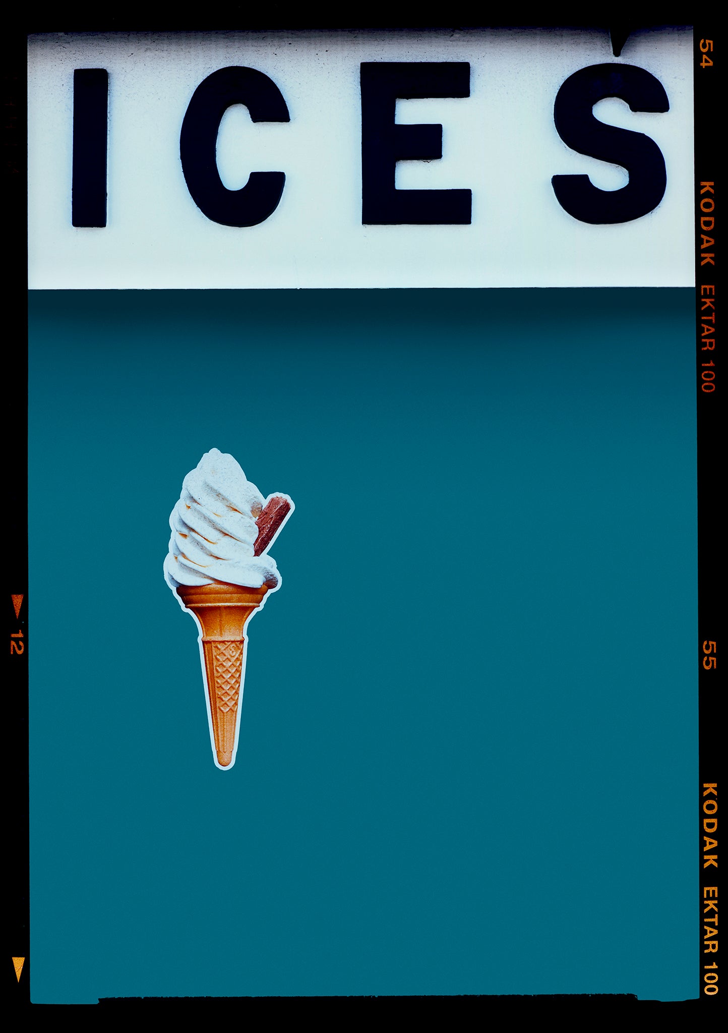 Photograph by Richard Heeps.  At the top black letters spell out ICES and below is depicted a 99 icecream cone sitting left of centre against a blue teal coloured background.  