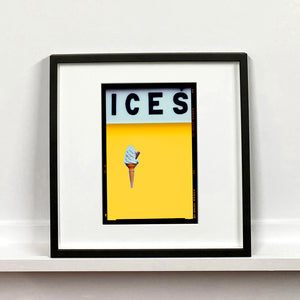 Ices honey yellow pop art typography colour photography print by Richard Heeps mounted square framed in black.