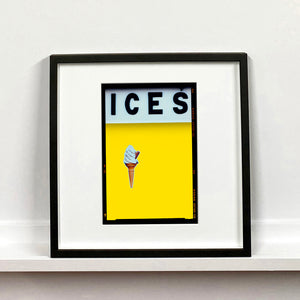 Ices lemon yellow pop art typography colour photography mounted square print by Richard Heeps framed in black.