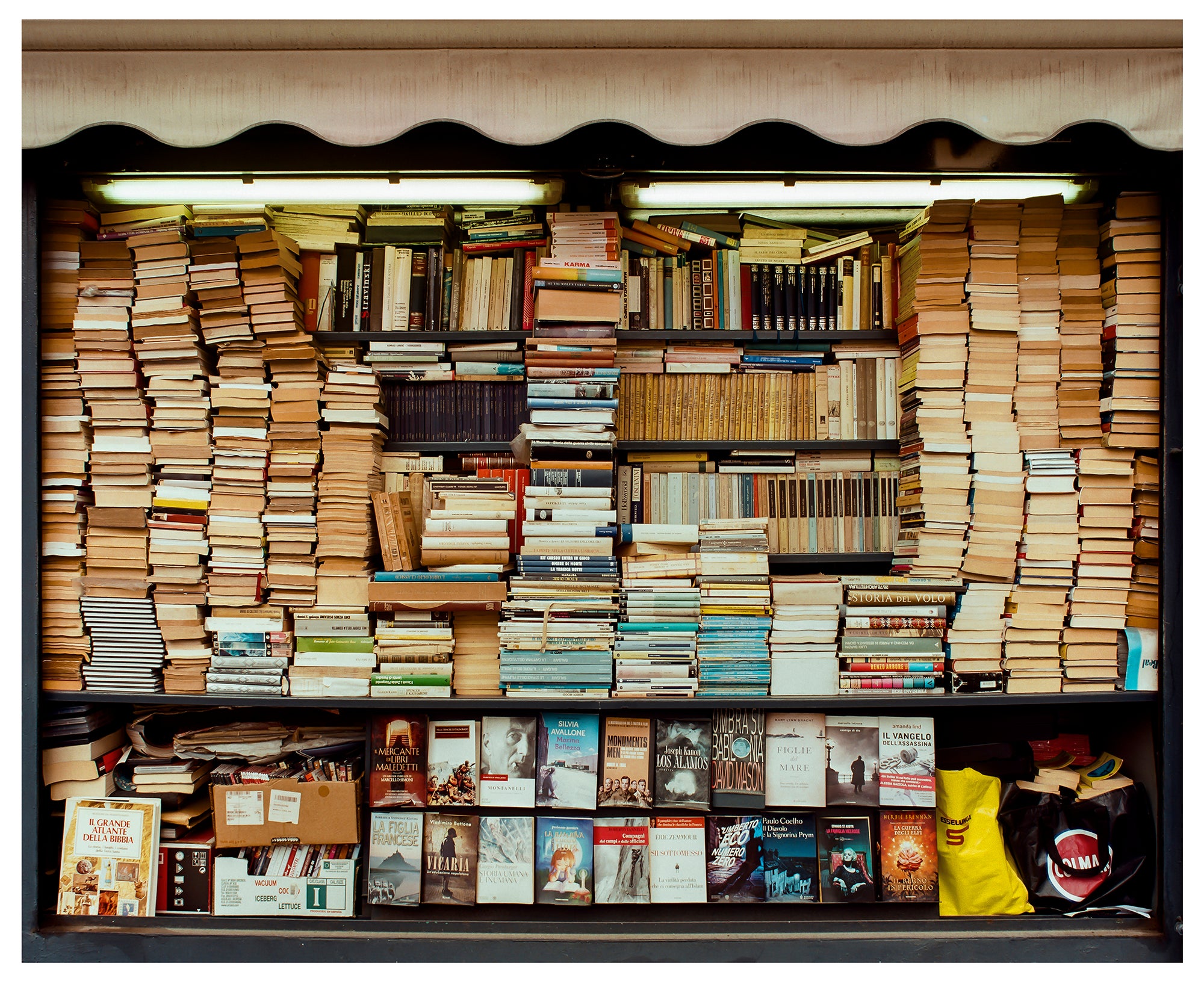 Karma, Italian book kiosk street photography from Richard Heeps Milan series.