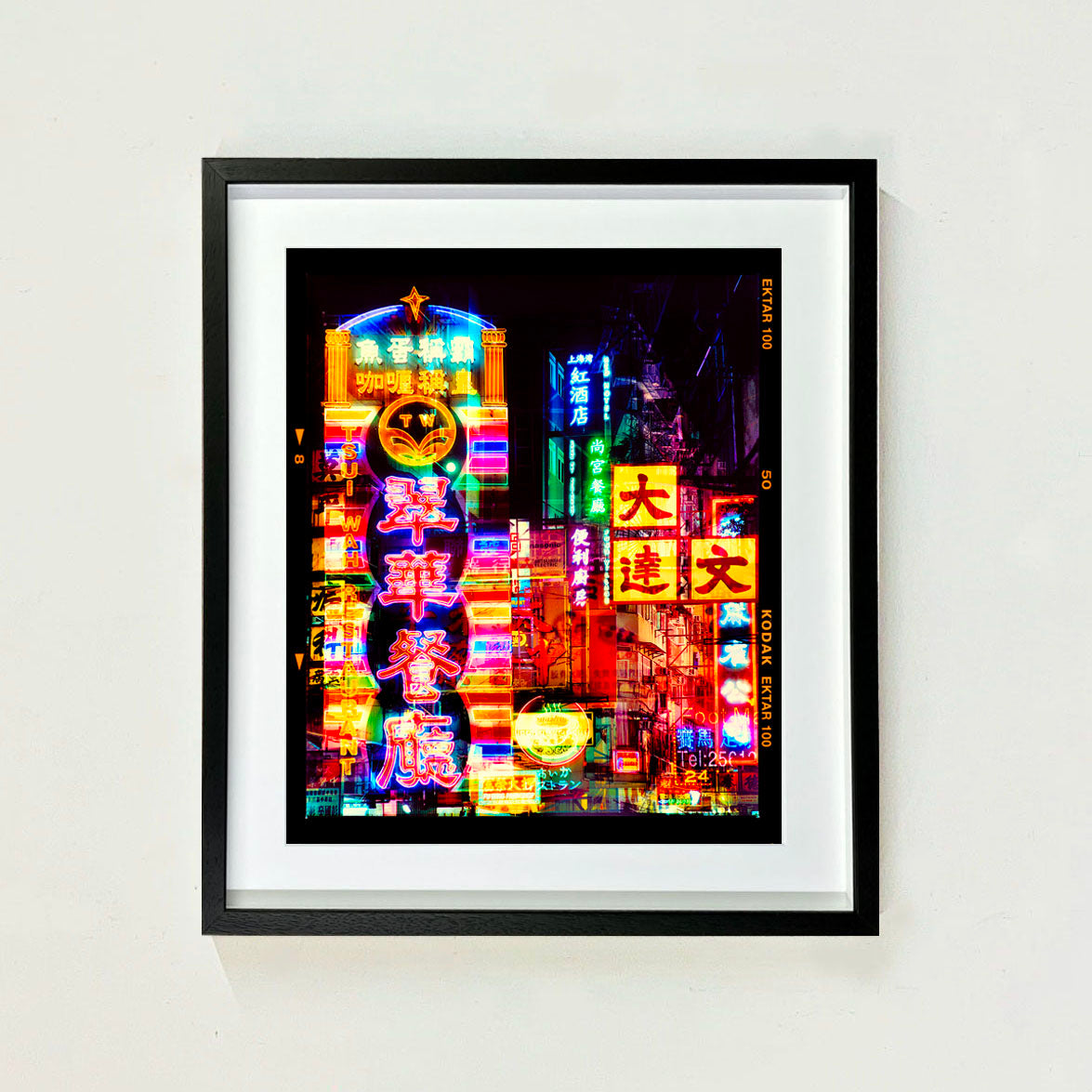 Lights of Mong Kok Hong Kong architecture street photography by Richard Heeps framed in black.