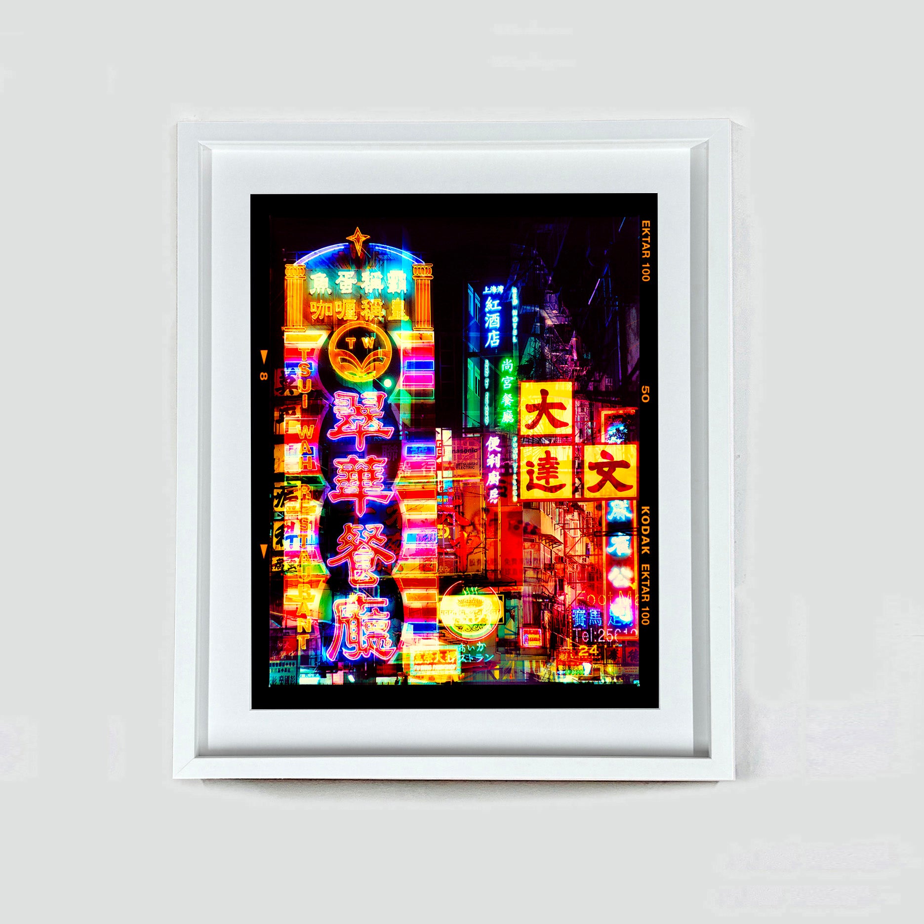 Lights of Mong Kok Hong Kong architecture street photography by Richard Heeps framed in white.