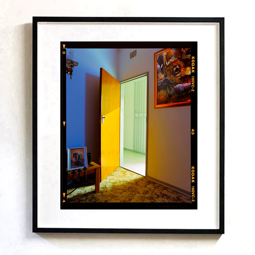 Recently sold artwork Lounge Doorway South African interior photograph framed in black by Richard Heeps.