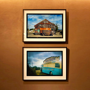 Richard Heeps holding Model T and Garage framed in black