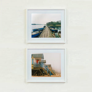 Ormesby Little Broad and Beach Huts, foggy day Norfolk photographs by Richard Heeps framed in white.