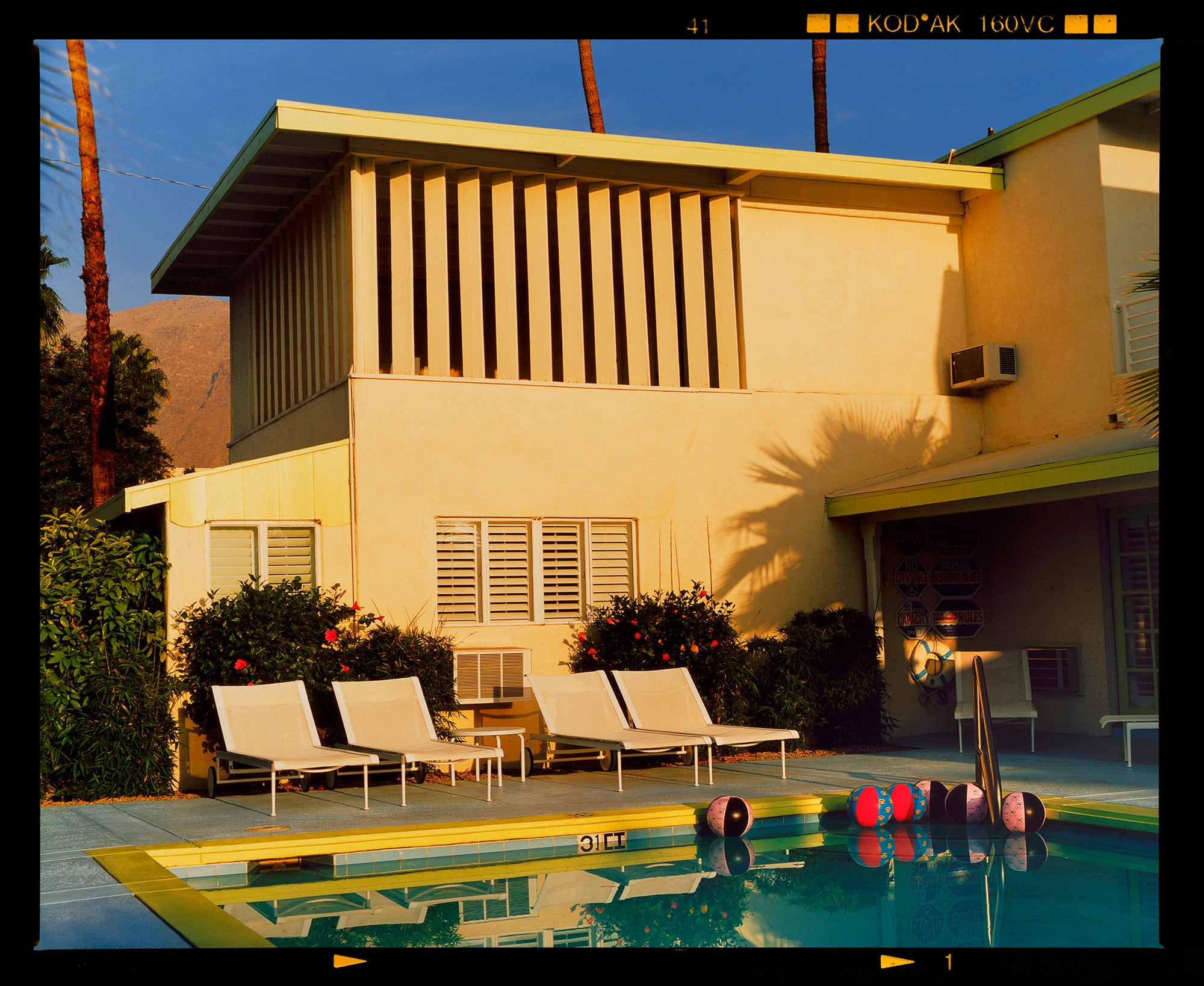 Photograph by Richard Heeps. Palm Springs Poolside, classic mid-century Palm Springs architecture, featuring cool blue skies and pool.