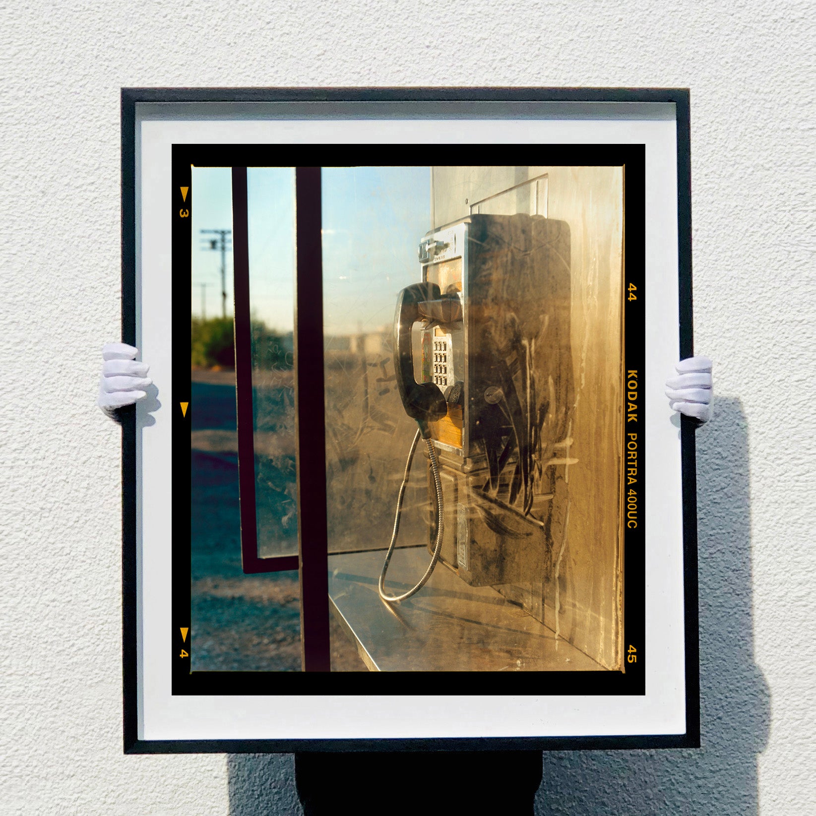 Call Box cinematic vintage telephone box Richard Heeps photograph in a large black frame.