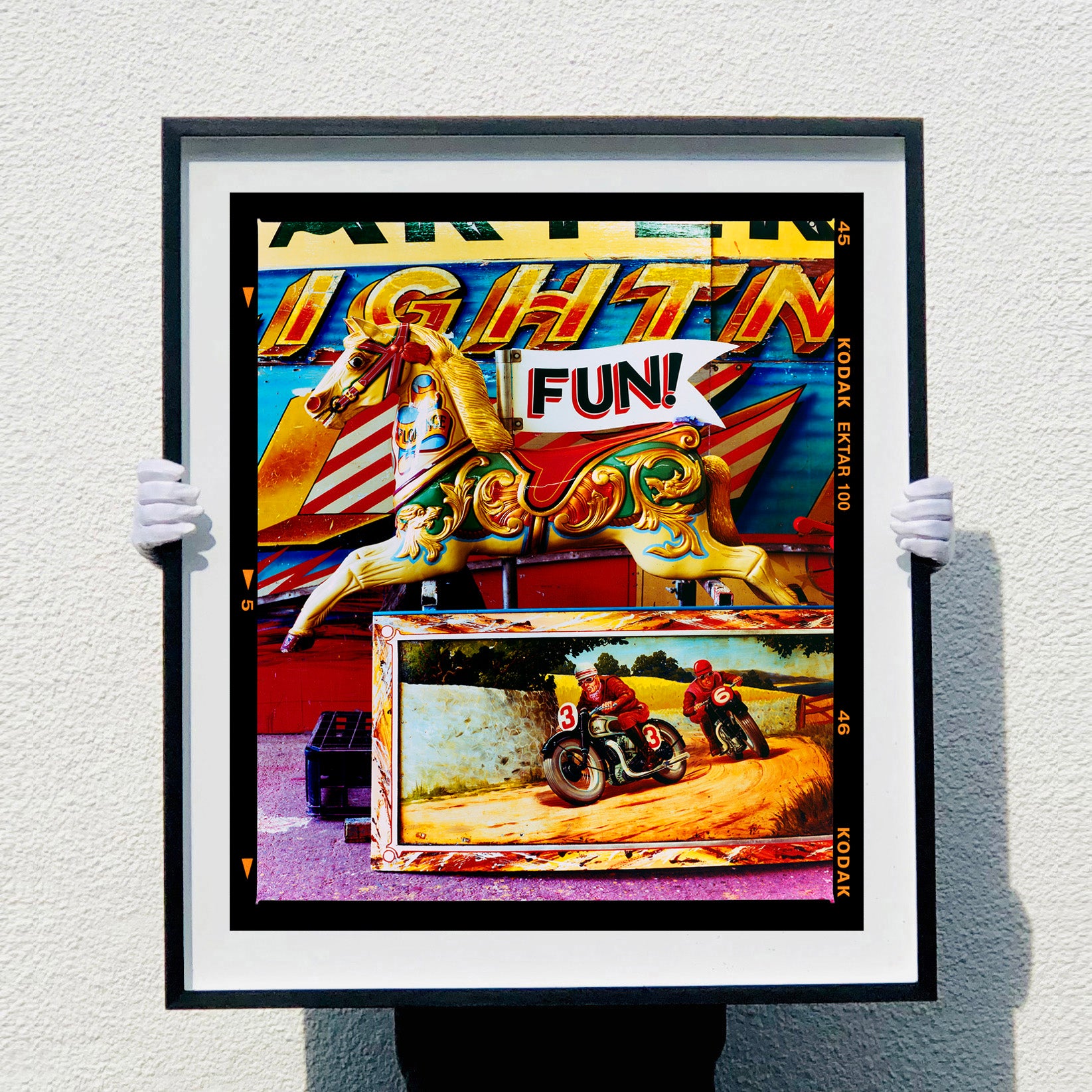 FUN! carousel horse photograph by Richard Heeps in a large black frame.