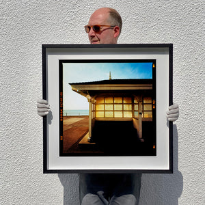 Seafront Shelters, British seaside architecture photographs by Richard Heeps print framed in black.