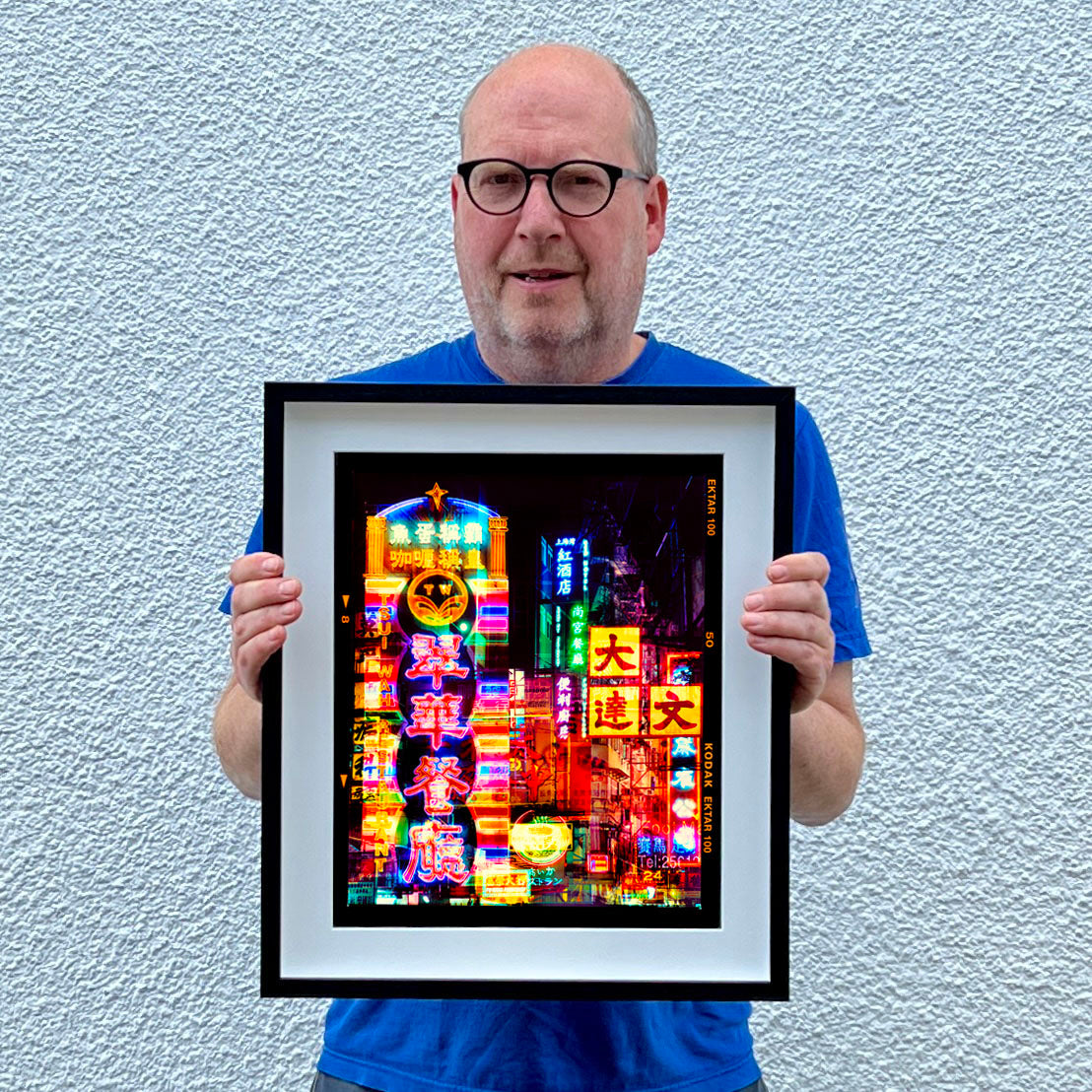 Richard Heeps holding Lights of Mong Kok Hong Kok architecture street photography framed in black.