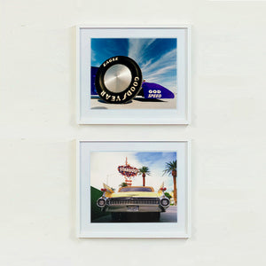 Two white framed photographs by Richard Heeps. The top photograph has the tyre and the very front tip of a drag car. The car's name is written on the front end "God Speed". Behind the car are white vertical clouds shooting through a blue sky. The bottom photo features Las Vegas and has the back of a yellow chevy car and above the car sits the sign for the Stardust casino.