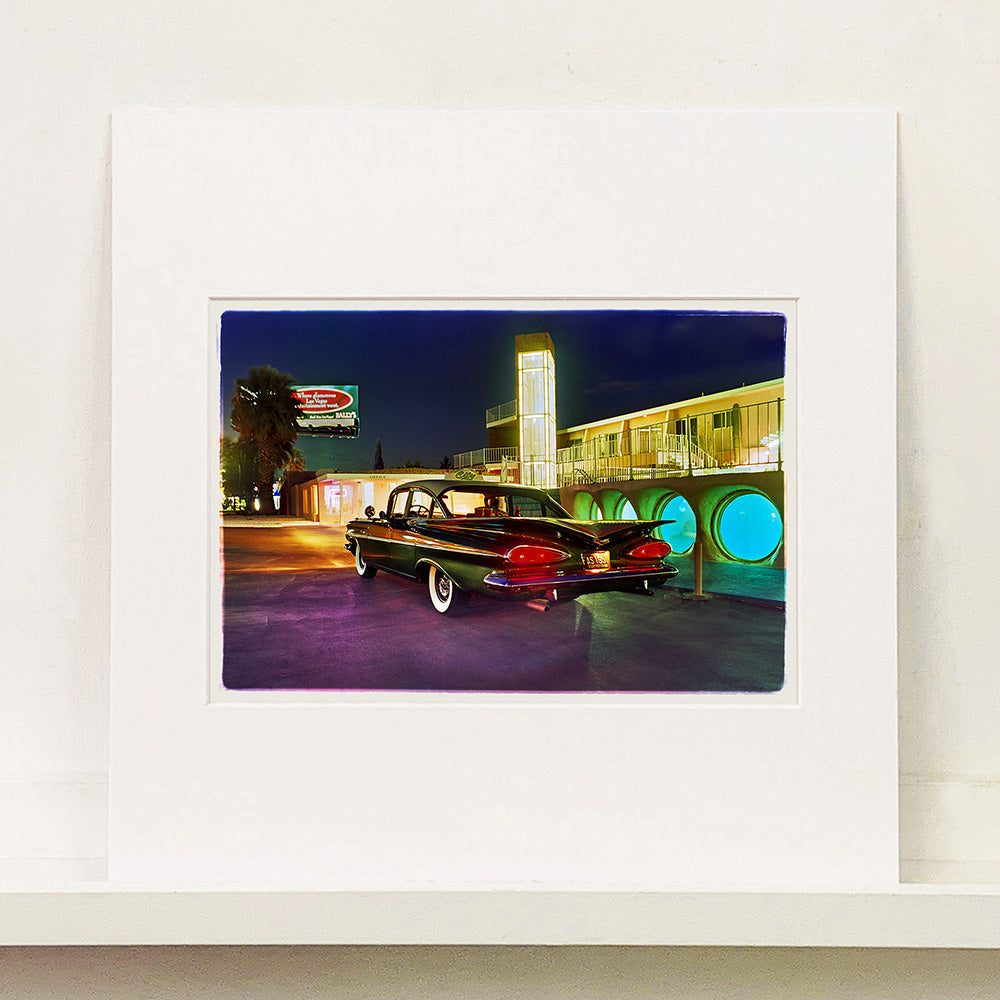 Mounted photograph by Richard Heeps. A Chevy Bel Air is central shot and off to the right are the pools and balcony of the Glass Pool Motel, Las Vegas.
