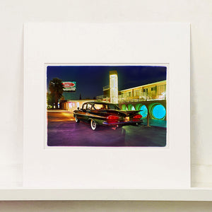Mounted photograph by Richard Heeps. A Chevy Bel Air is central shot and off to the right are the pools and balcony of the Glass Pool Motel, Las Vegas.