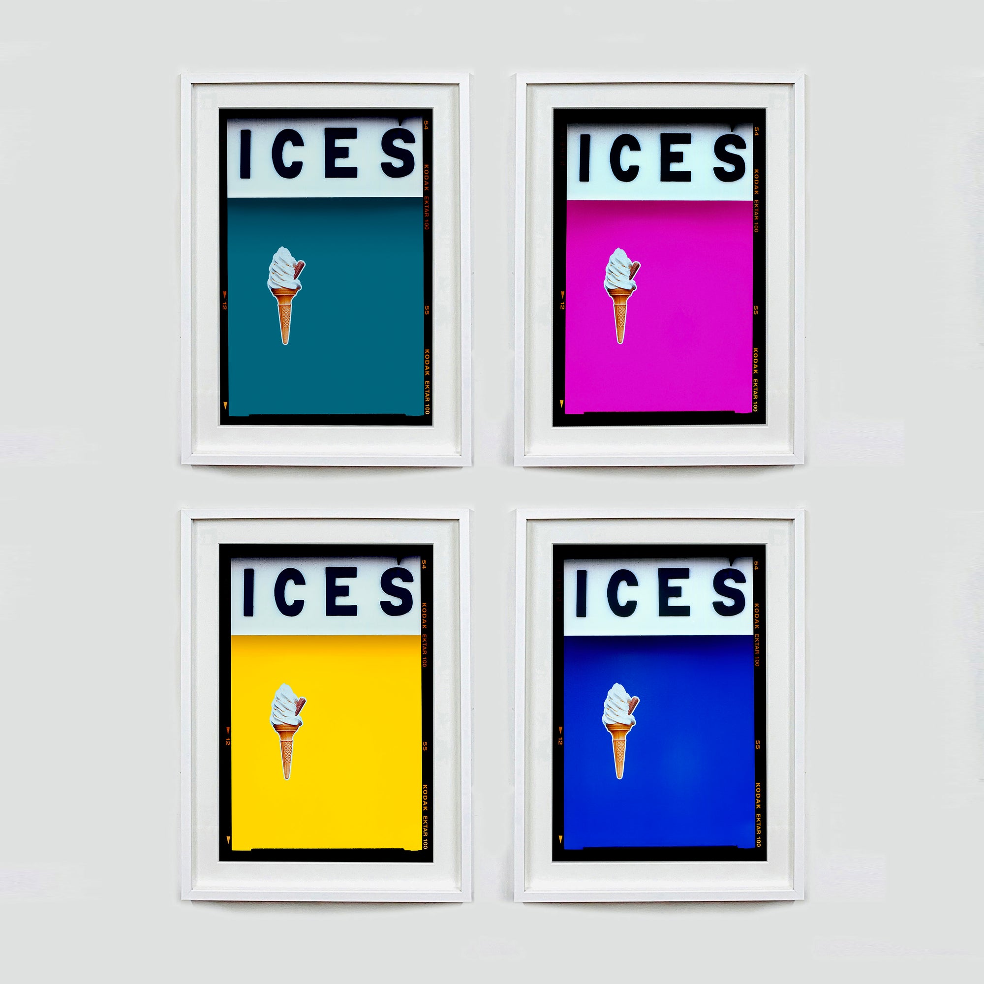 Set of four (2x2) white framed photographs by Richard Heeps.  Four identical photographs (apart from the block colour), at the top black letters spell out ICES and below is depicted a 99 icecream cone sitting left of centre set against, in turn, a blue teal, pink, yellow and blue coloured background.  