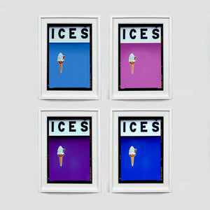 Set of four (2x2) white framed photographs by Richard Heeps.  Four identical photographs (apart from the block colour), at the top black letters spell out ICES and below is depicted a 99 icecream cone sitting left of centre set against, in turn, a baby blue, plum, purple and blue coloured background.  