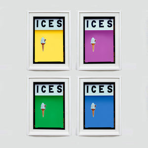Set of four (2x2) white framed photographs by Richard Heeps.  Four identical photographs (apart from the block colour), at the top black letters spell out ICES and below is depicted a 99 icecream cone sitting left of centre set against, in turn, a sherbert yellow, plum, green and baby blue coloured background.  