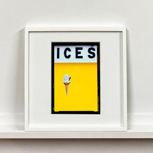 White framed photograph by Richard Heeps.  Yellow typography print of an ice cream on a yellow colour block with the Kodak film rebate.