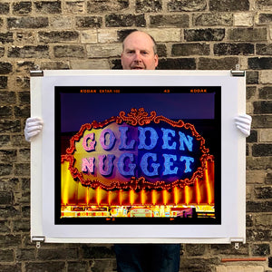 Golden Nugget Norfolk British seaside arcade sign photograph by Richard Heeps holding the print