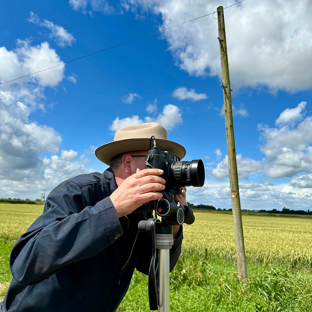 Richard Heeps photographing in the The Fens Cambridgeshire with a Fuji 6x9 vintage film camera 