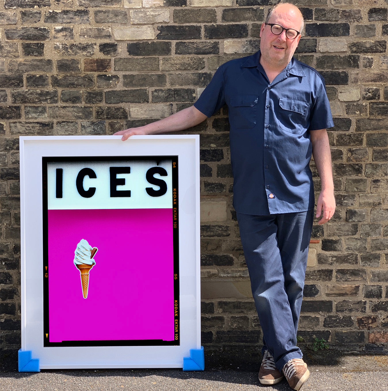 Pink bestselling artwork by Richard Heeps ICES Pink framed in white.