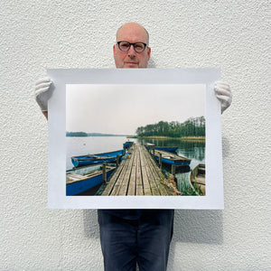 Richard Heeps holding Ormesby Little Broad Norfolk print.