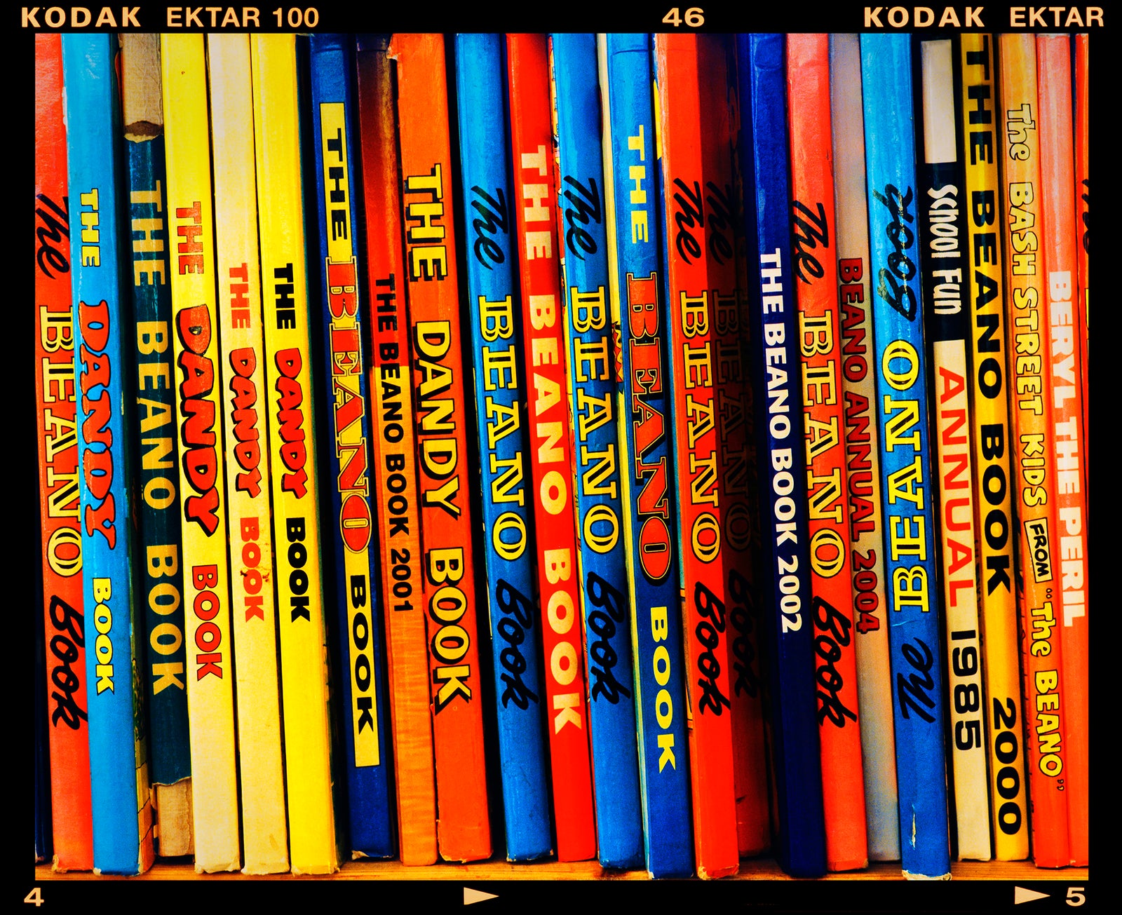 Vintage book spines multi-colour photograph by Richard Heeps.