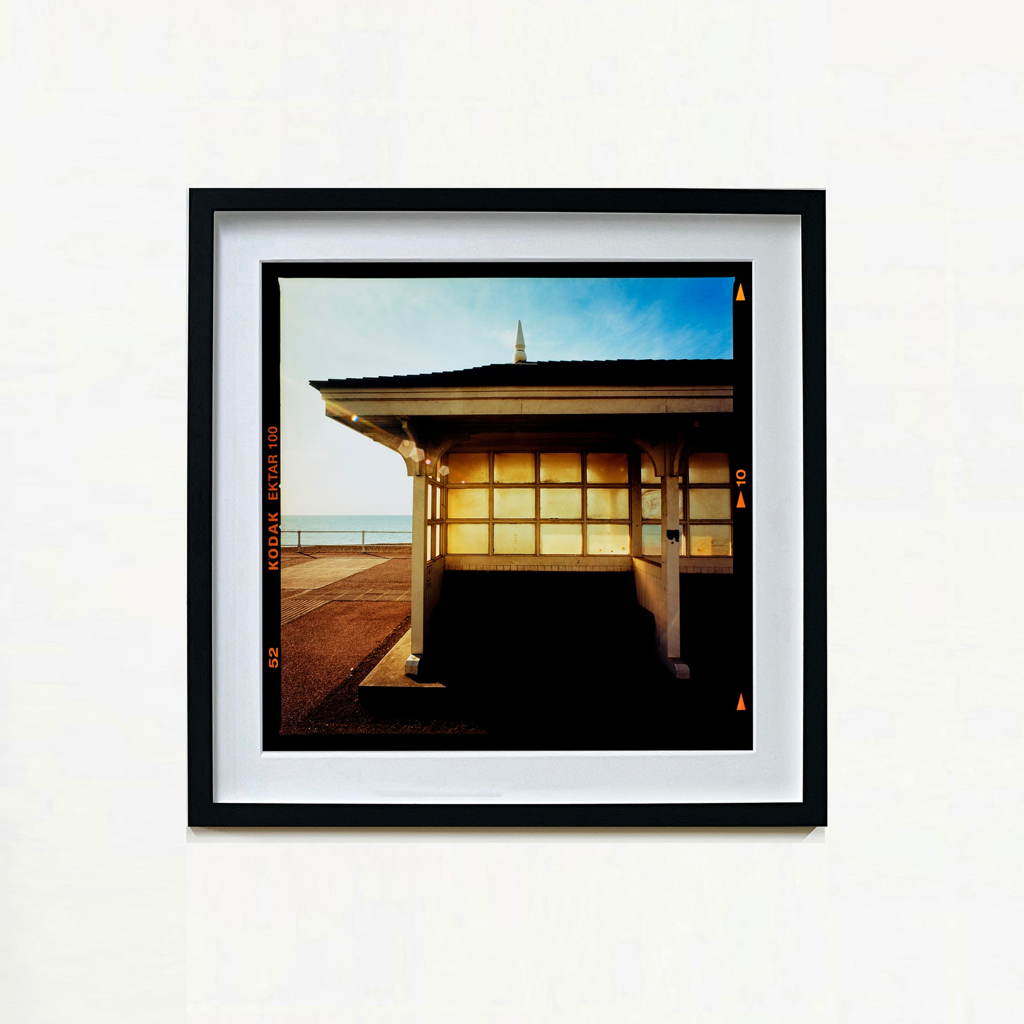 Seafront Shelters, British seaside architecture photographs by Richard Heeps print framed in black.