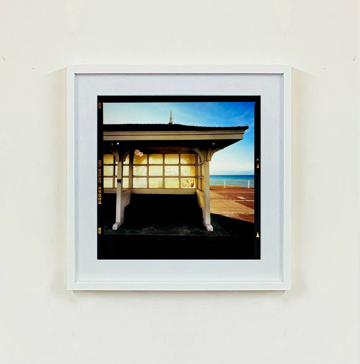 Seafront Shelter, British seaside architecture photograph by Richard Heeps print in a white frame.