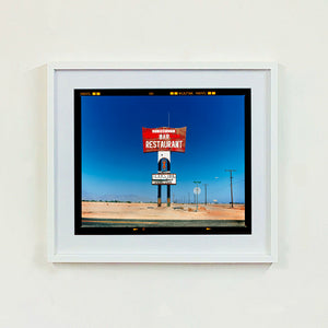 Sundowner Landscape Salton Sea California roadside America photograph by Richard Heeps framed in white.
