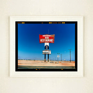 Sundowner Landscape Salton Sea California roadside America large photograph by Richard Heeps framed in white.