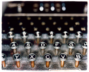 Photograph by Richard Heeps.  A detailed examination of some of the letters on the Engima Machine at Bletchley Park in England. 
