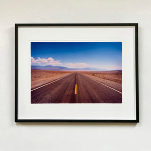 Recently sold artwork The Road to Death Valley photograph by Richard Heeps framed in black.