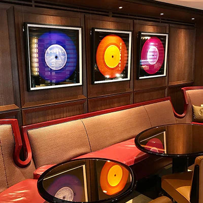 Heidler and Heeps vinyl collection limited edition prints hanging in a bar in London.