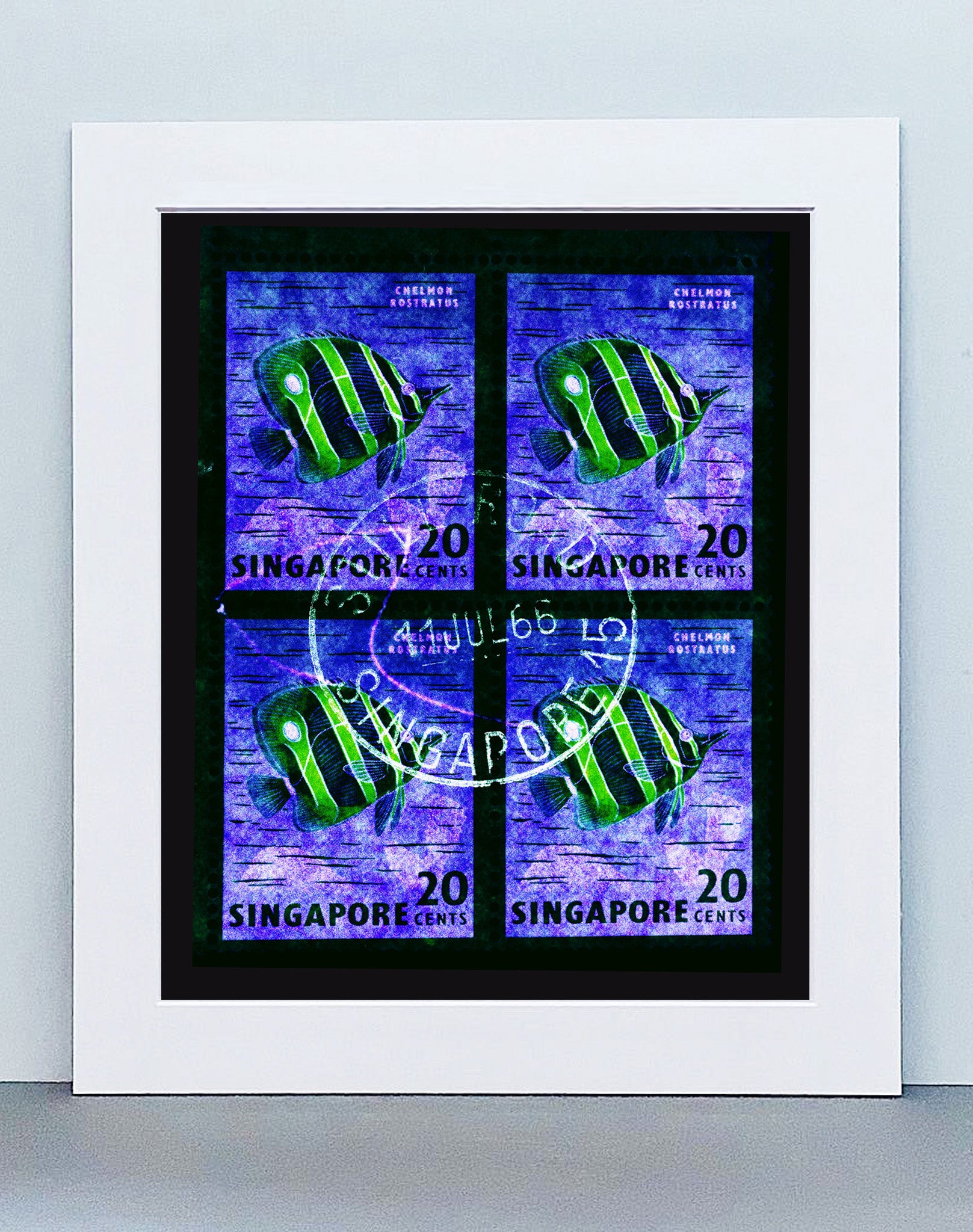 20 Cents Singapore Butterfly Fish (Gold). These historic postage stamps that make up the Heidler & Heeps Stamp Collection, Singapore Series “Postcards from Afar” have been given a twenty-first century pop art lease of life. The fine detailed tapestry of the original small postage stamp has been brought to life, made unique by the franking stamp and Heidler & Heeps specialist darkroom process.