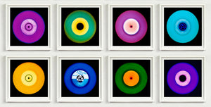 Photographs by Heidler and Heeps. A set of 8 (2 rows of 4) Vinyls in striking colours, with white frames. 