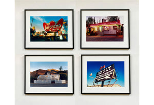 'Adult Entertainment' photographed in Beatty, Nevada, shows bold typography sitting prominently on an American road sign, against a background of bright blue sky. This fun and cheeky artwork was captured on a road trip through America and features in Richard Heeps' sold out book 'Man's Ruin'. An edition of this artwork recently sold at auction in The Auction Collective exhibition 'Hypercolor-Pop-Culture'.