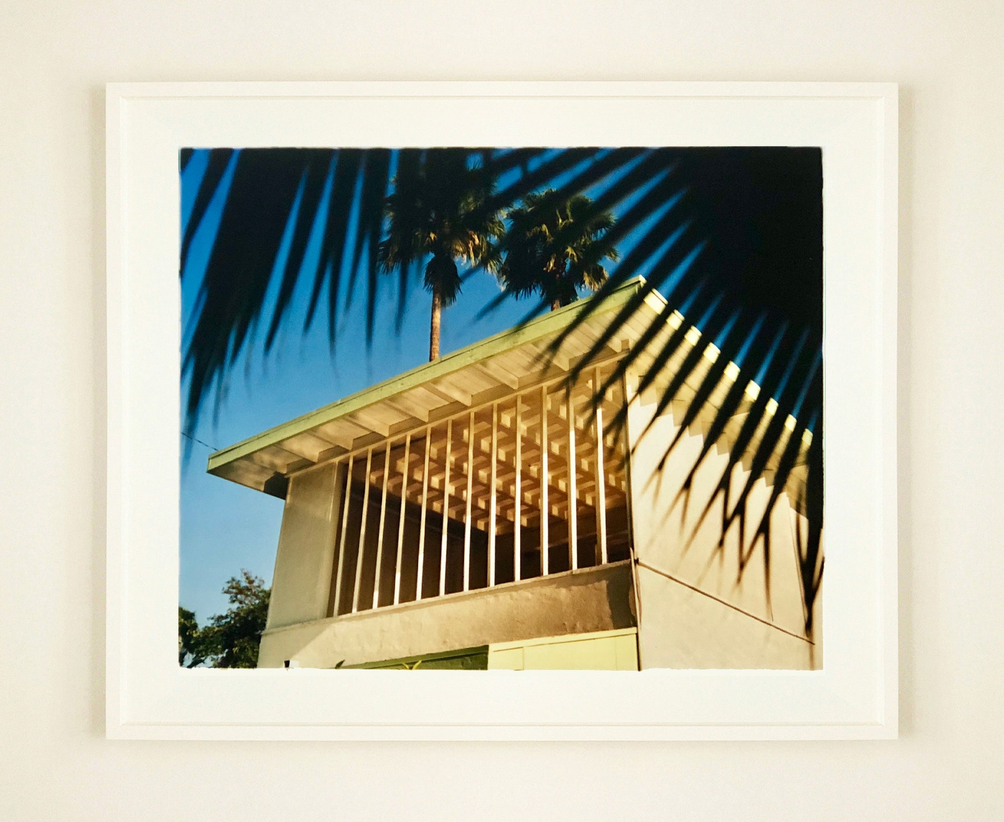 Part of Richard Heeps' 'Dream in Colour' Series, here he perfectly captures Palm Springs mid-century modern architecture, amongst iconic Californian palm trees.