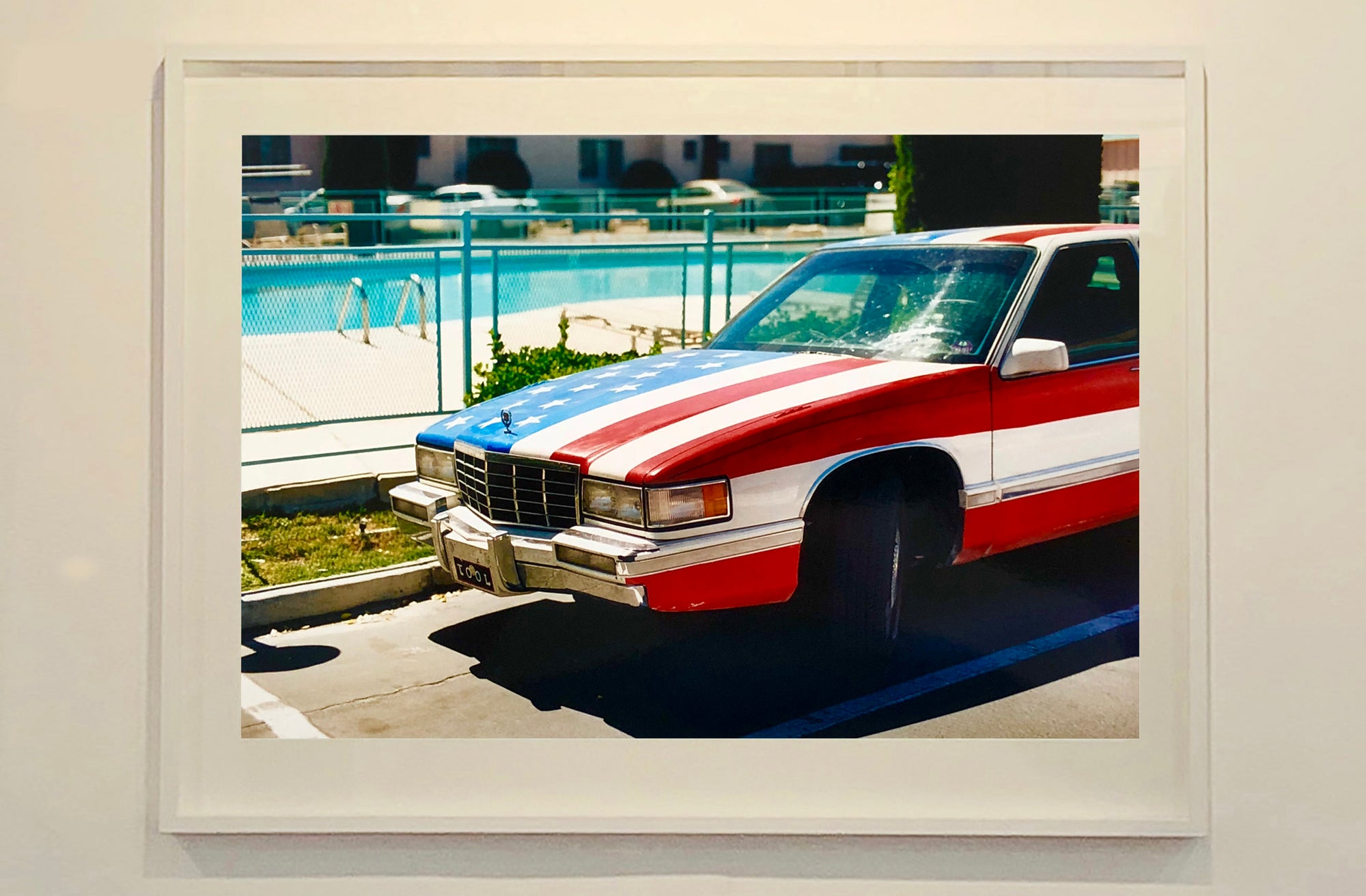 An American car parked up by the swimming pool outside the Algiers Hotel in Las Vegas. Photography by Richard Heeps, part of his 'Dream in Colour' series.
