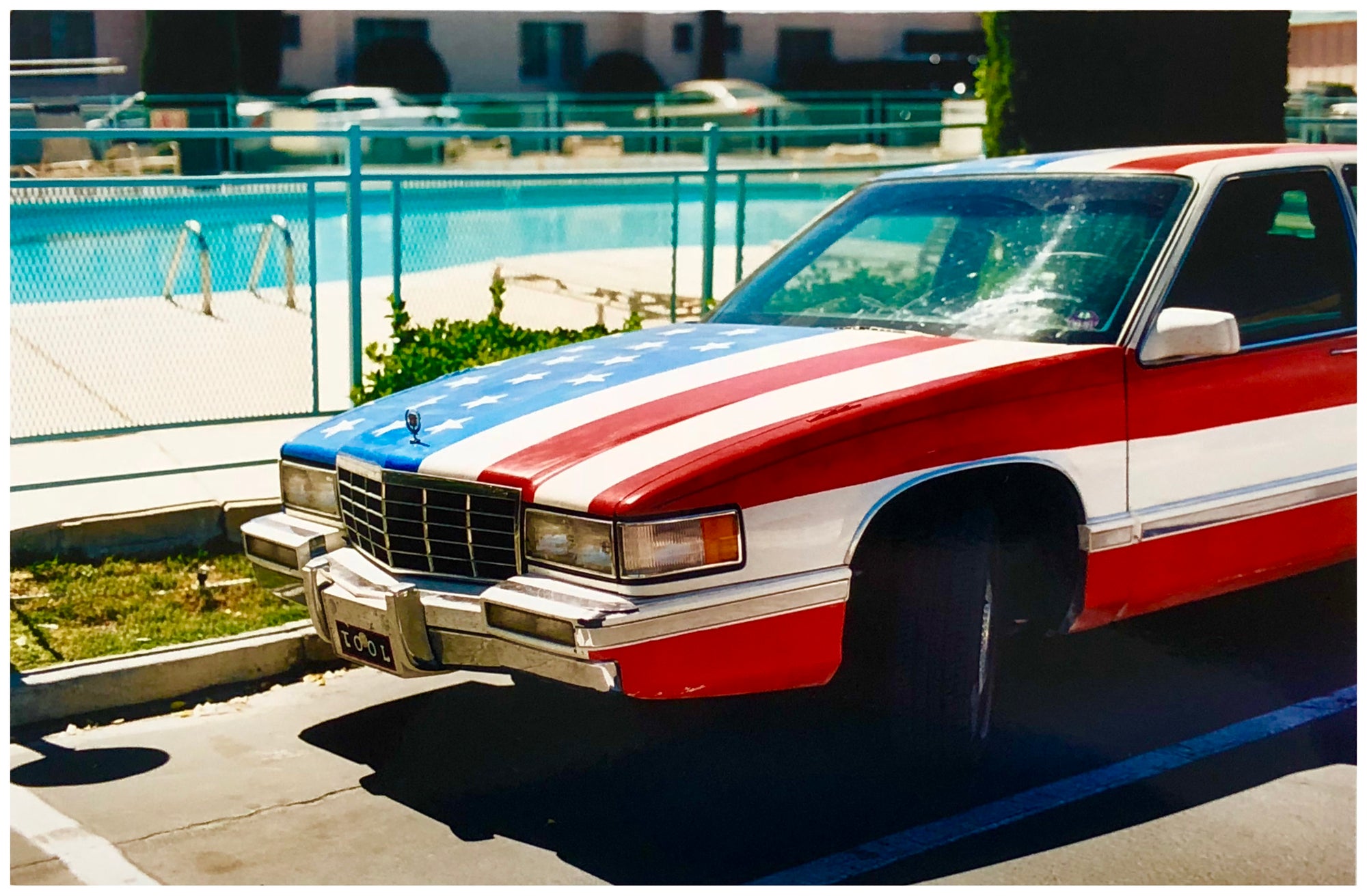 An American flag on a car parked by a pool at the Algiers Hotel in Las Vegas.