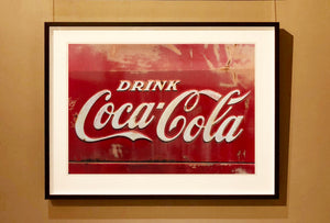 This artwork is one of Richard's many iconic Coca-Cola sign artworks. This one was captured in the So-Cal Speed Shop in Phoenix, Arizona, and has an interesting raw distressed quality. The classic Coca-Cola red, combined with the texture and relief text really make this piece pop.